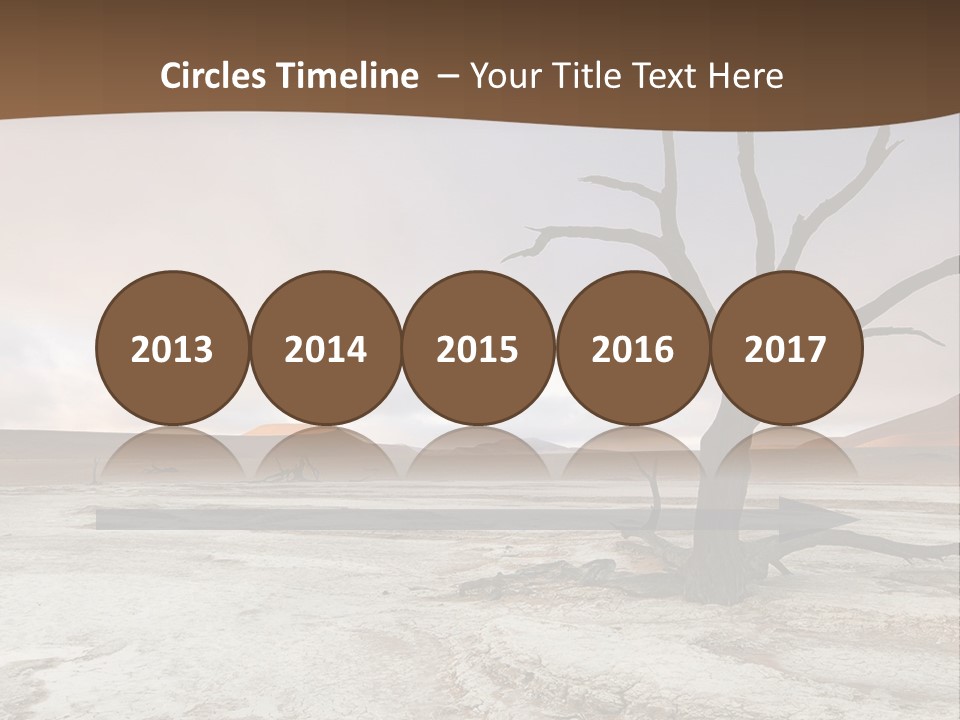 A Dead Tree In The Middle Of A Desert PowerPoint Template