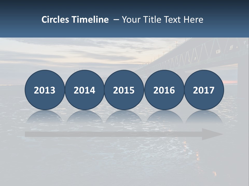A Bridge Over A Body Of Water At Sunset PowerPoint Template