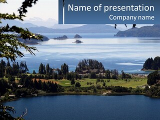 A Large Body Of Water Surrounded By Trees PowerPoint Template