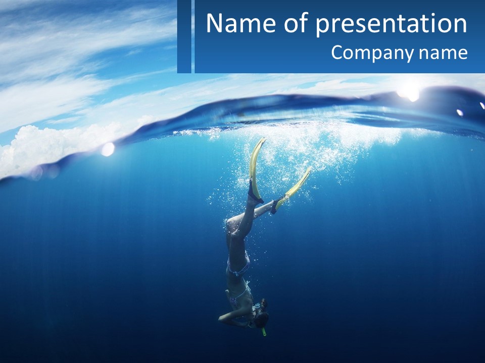 A Person Swimming In The Ocean With A Surfboard PowerPoint Template