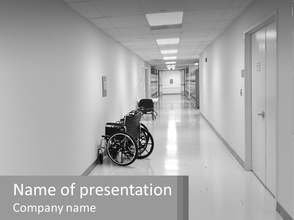 A Black And White Photo Of A Hospital Hallway PowerPoint Template