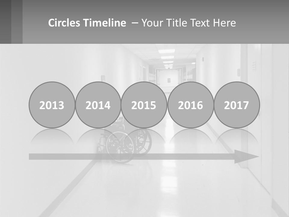 A Black And White Photo Of A Hospital Hallway PowerPoint Template