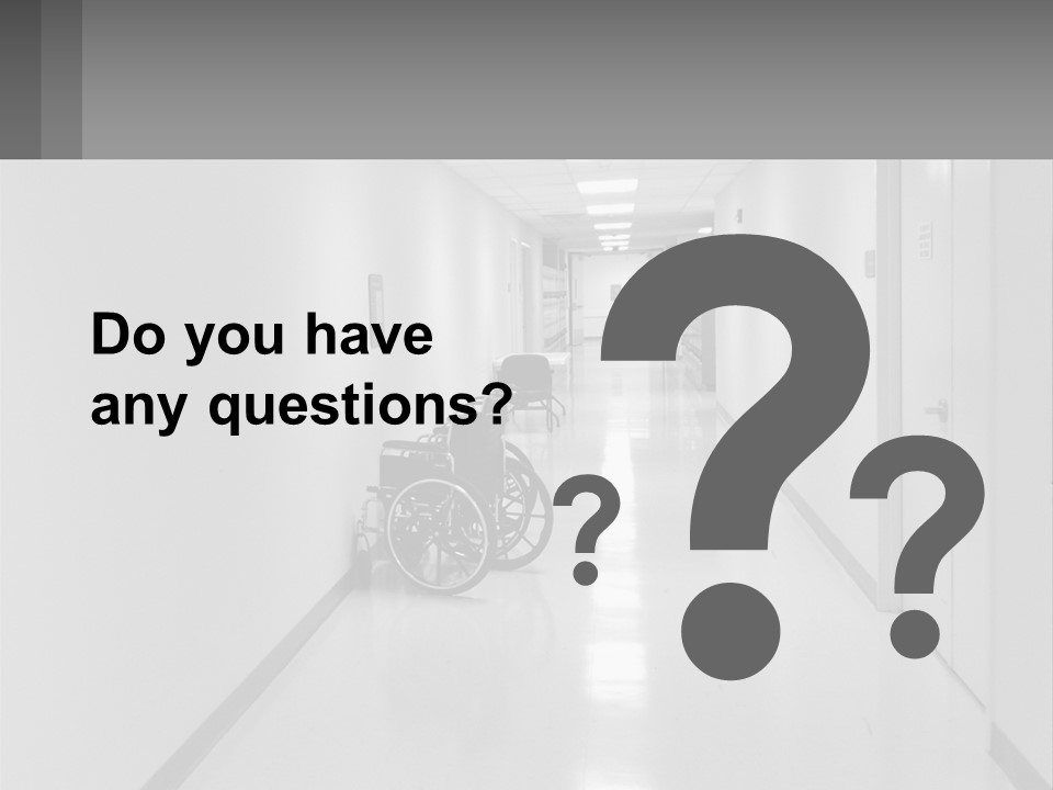 A Black And White Photo Of A Hospital Hallway PowerPoint Template