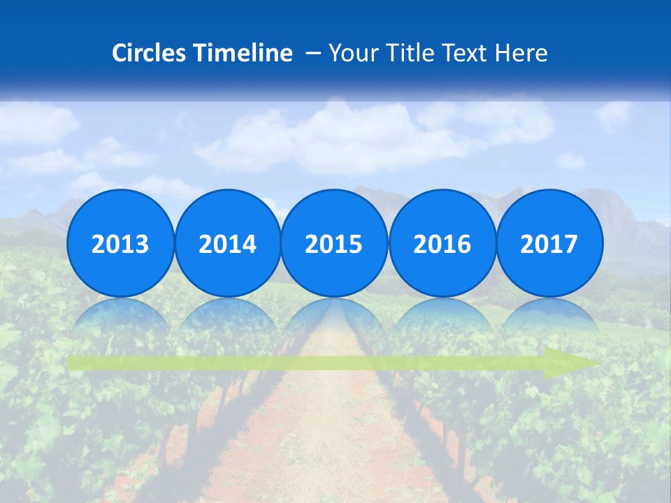 A Vineyard Field With Mountains In The Background PowerPoint Template