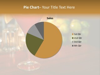 A Red Cocktail Sitting On Top Of A Wooden Table PowerPoint Template