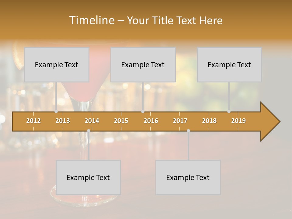 A Red Cocktail Sitting On Top Of A Wooden Table PowerPoint Template