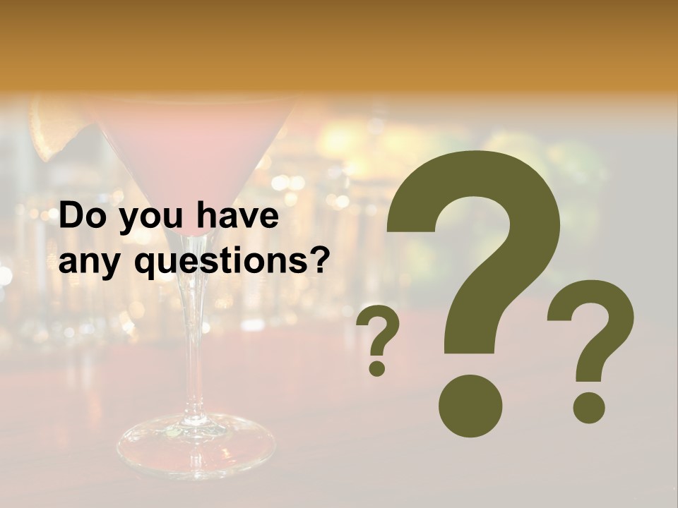 A Red Cocktail Sitting On Top Of A Wooden Table PowerPoint Template