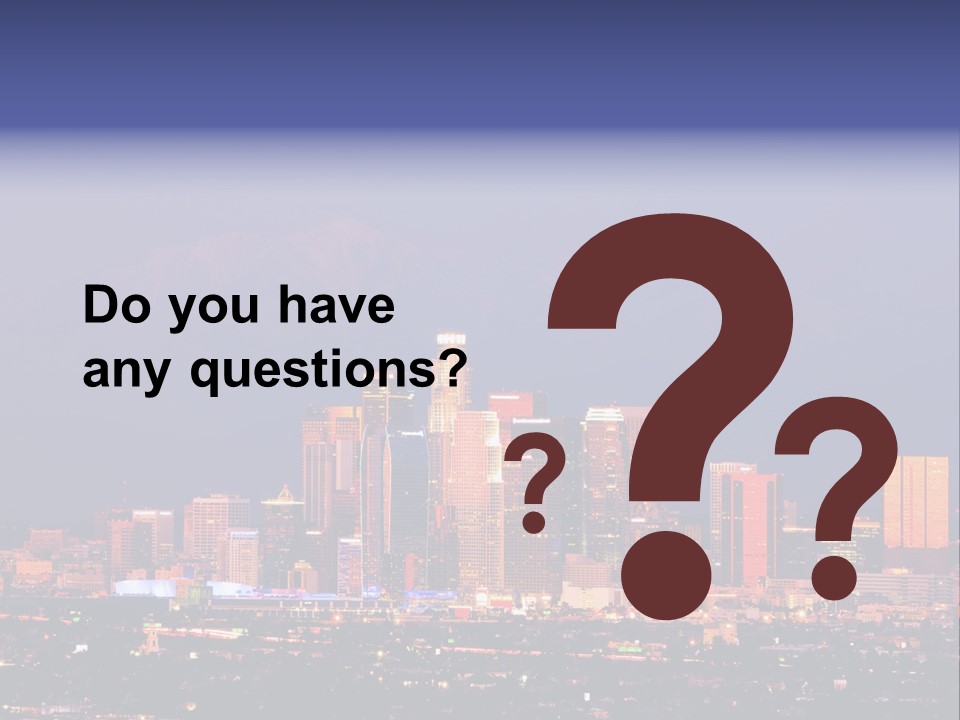 A City Skyline With Mountains In The Background PowerPoint Template
