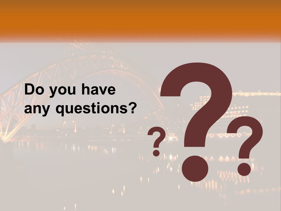 A Bridge Over A Body Of Water At Night PowerPoint Template