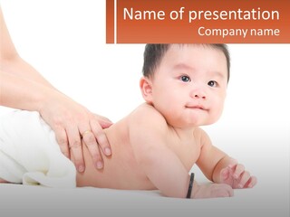 A Baby Laying On Its Back With A Person Holding It PowerPoint Template