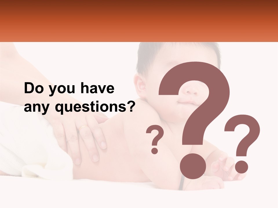 A Baby Laying On Its Back With A Person Holding It PowerPoint Template