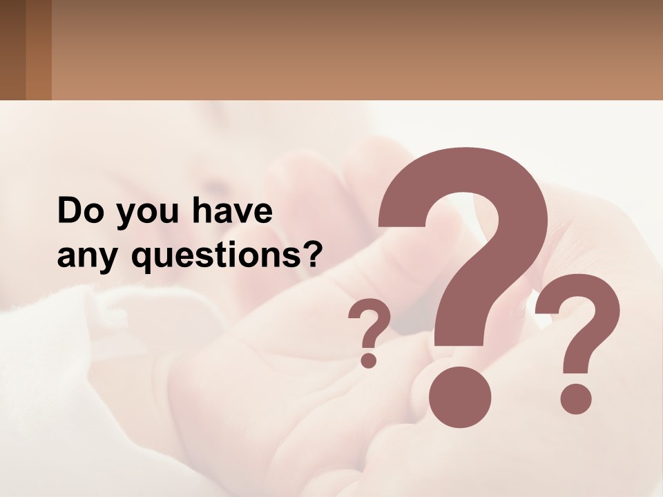 A Person Holding A Baby In Their Hands PowerPoint Template