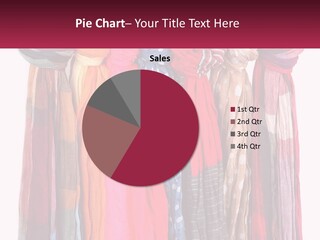 A Bunch Of Scarves Hanging On A Rack PowerPoint Template