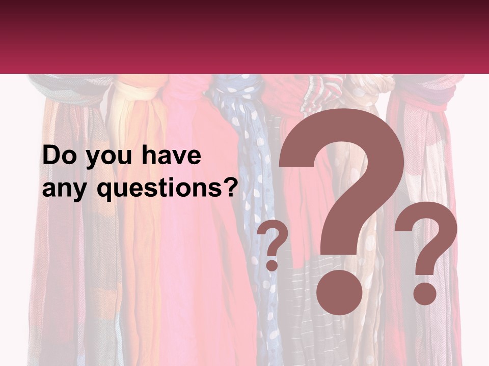 A Bunch Of Scarves Hanging On A Rack PowerPoint Template