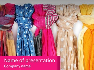 A Bunch Of Scarves Are Lined Up In A Row PowerPoint Template