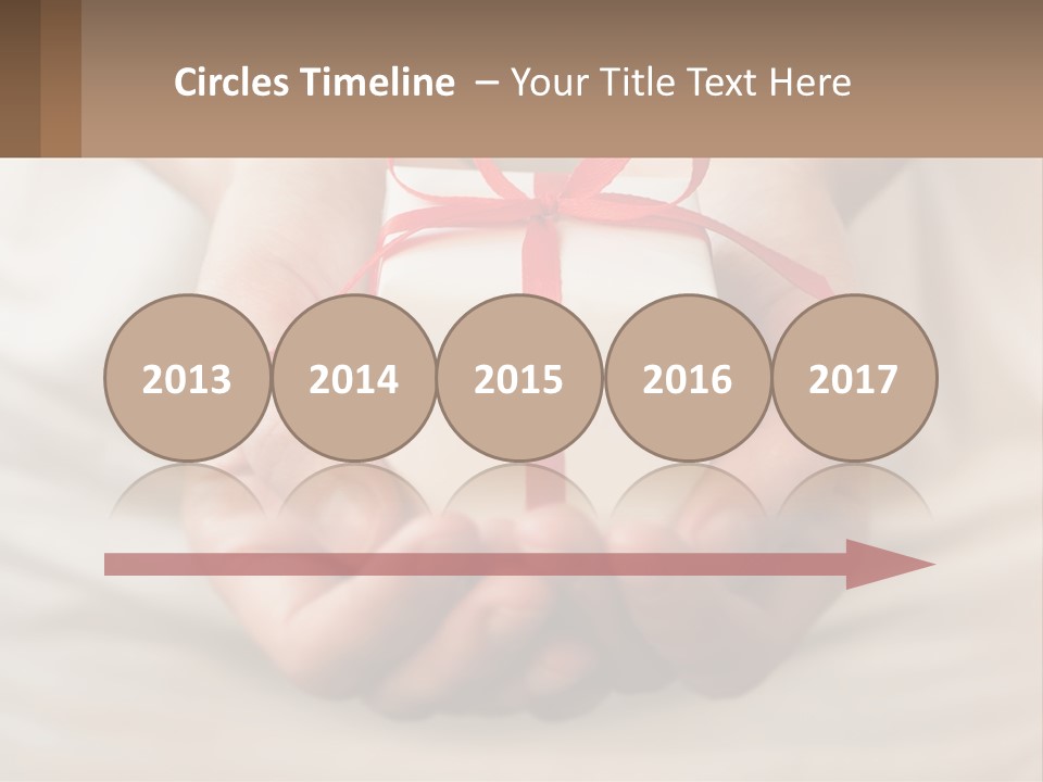 A Person Holding A Present In Their Hands PowerPoint Template