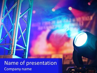 A Stage With A Projector Light On It PowerPoint Template
