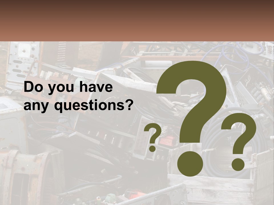A Pile Of Old Electrical Equipment In A Yard PowerPoint Template