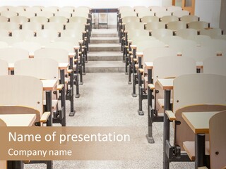 A Room Filled With Lots Of Desks And Chairs PowerPoint Template