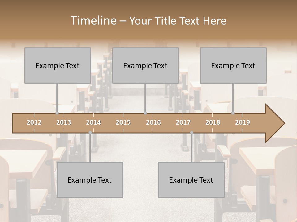 A Room Filled With Lots Of Desks And Chairs PowerPoint Template