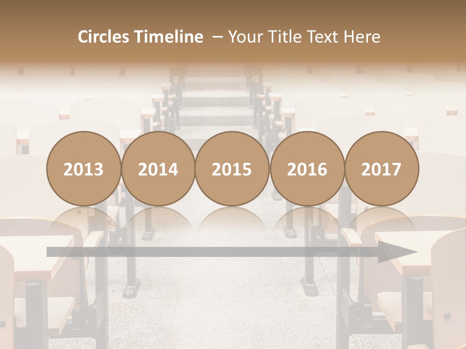 A Room Filled With Lots Of Desks And Chairs PowerPoint Template
