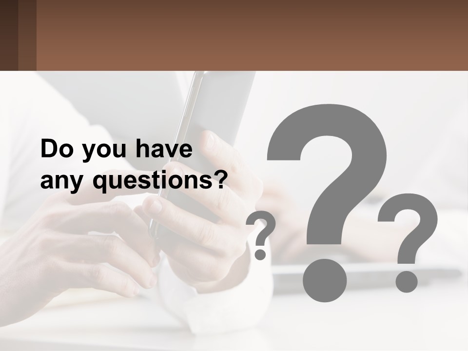 A Person Using A Cell Phone In Front Of A Laptop PowerPoint Template