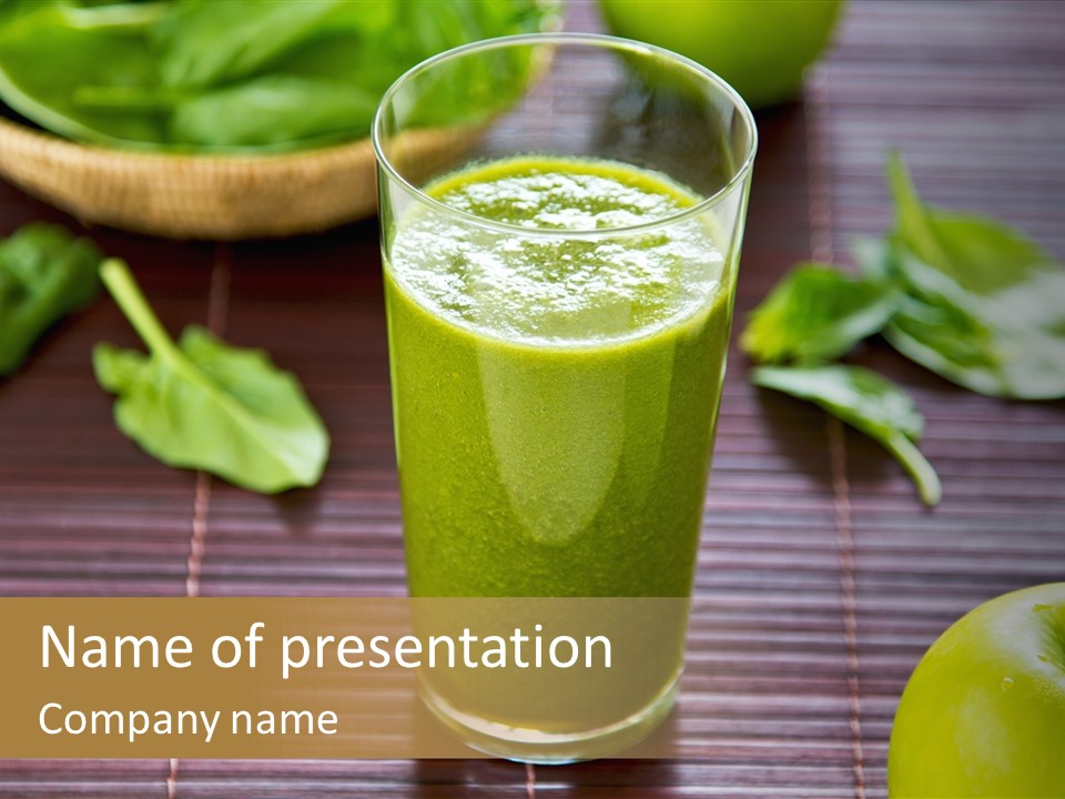 A Glass Of Green Juice On A Table PowerPoint Template