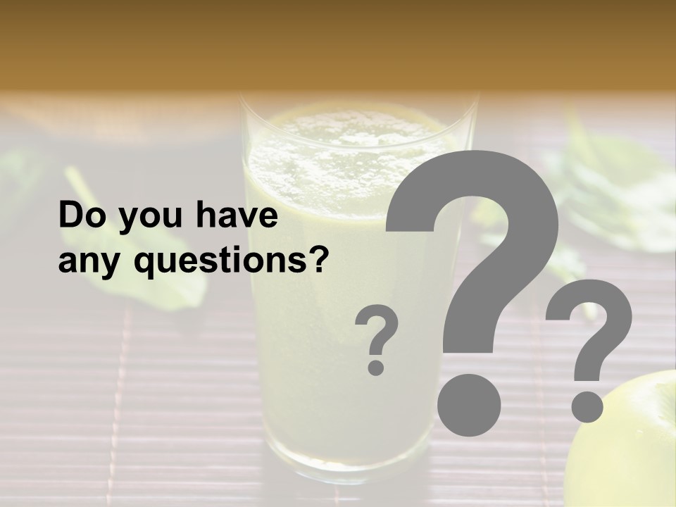 A Glass Of Green Juice On A Table PowerPoint Template