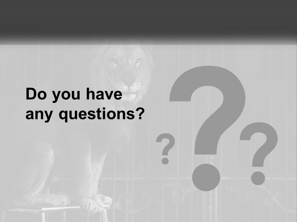 A Lion Sitting In A Cage On Top Of A Table PowerPoint Template