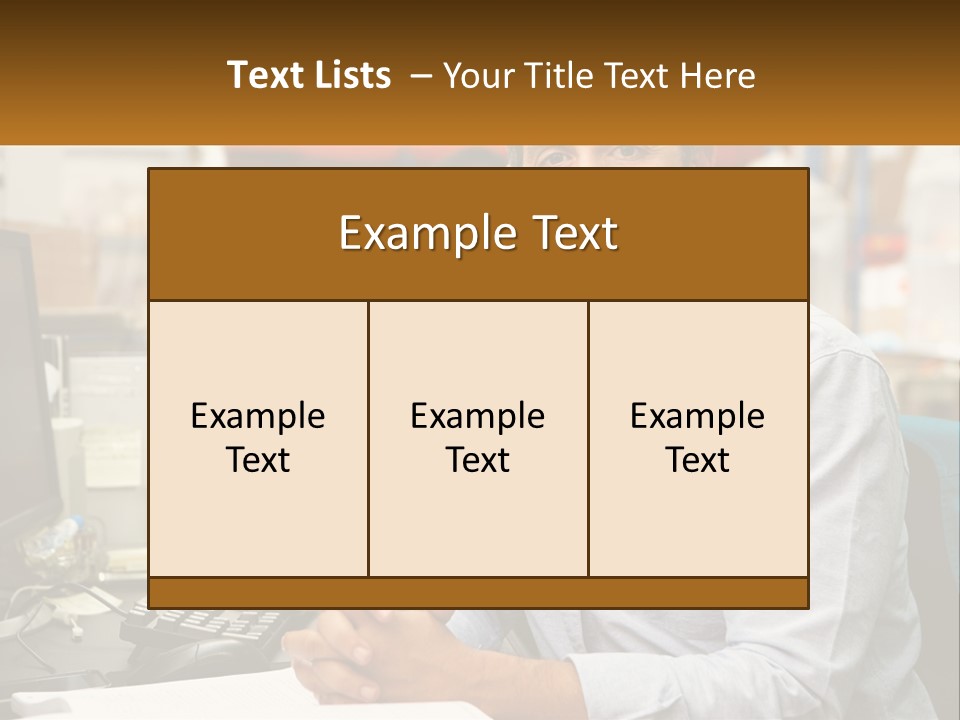 A Man Sitting At A Desk In Front Of A Computer PowerPoint Template