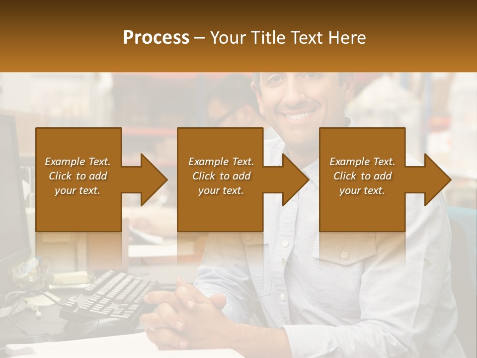 A Man Sitting At A Desk In Front Of A Computer PowerPoint Template