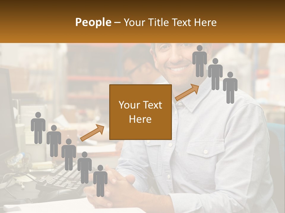 A Man Sitting At A Desk In Front Of A Computer PowerPoint Template