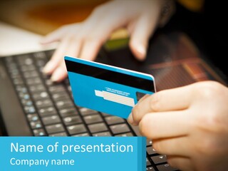 A Person Holding A Credit Card While Using A Laptop PowerPoint Template