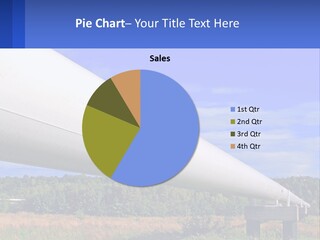 A Large White Pipe In The Middle Of A Field PowerPoint Template