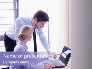 A Man And A Woman Looking At A Laptop PowerPoint Template