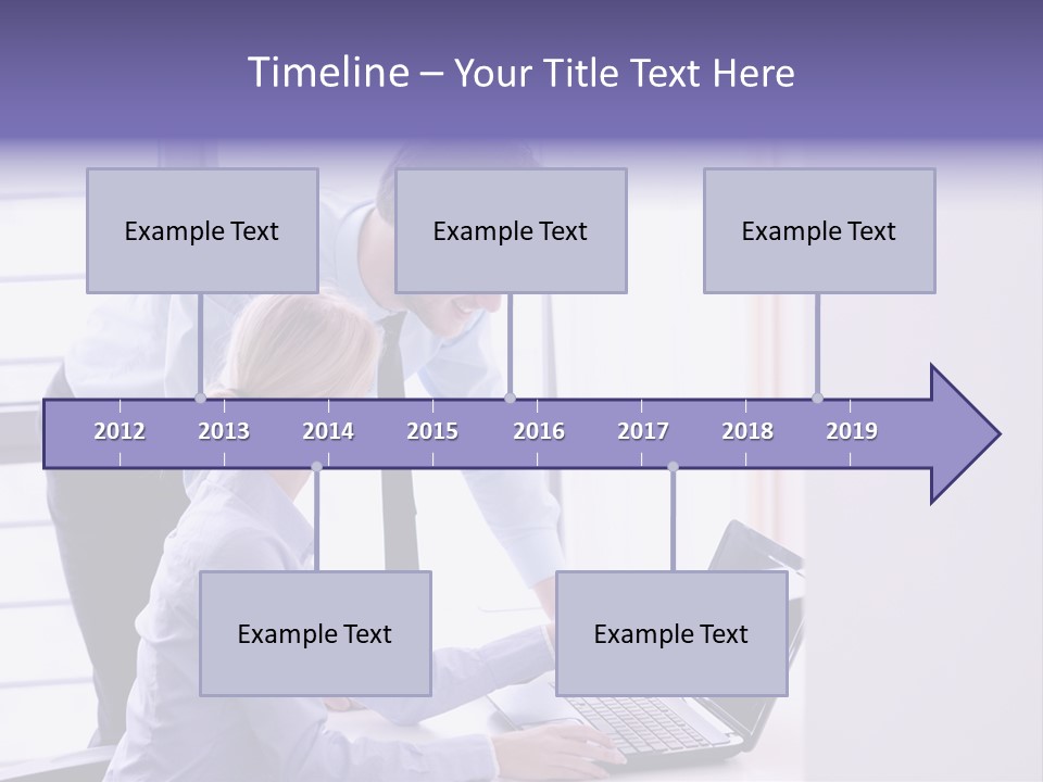 A Man And A Woman Looking At A Laptop PowerPoint Template