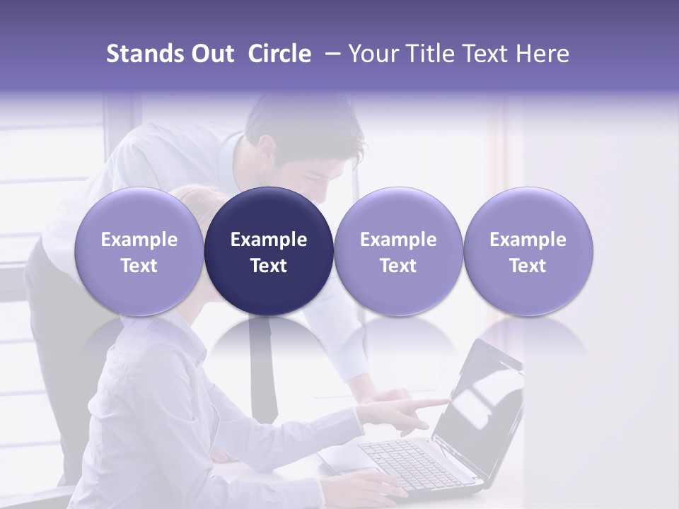 A Man And A Woman Looking At A Laptop PowerPoint Template