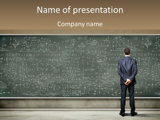 A Man Standing In Front Of A Blackboard With A Lot Of Writing On It PowerPoint Template