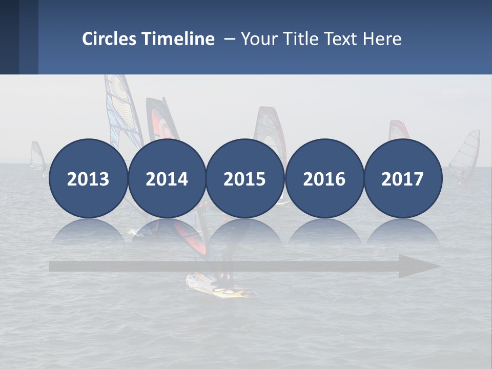 A Woman Windsurfing In The Ocean With Other Sailboats In The Background PowerPoint Template