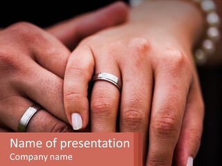 Two People Holding Hands With Wedding Rings On Their Fingers PowerPoint Template