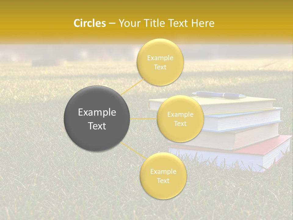 A Stack Of Books Sitting On Top Of A Lush Green Field PowerPoint Template