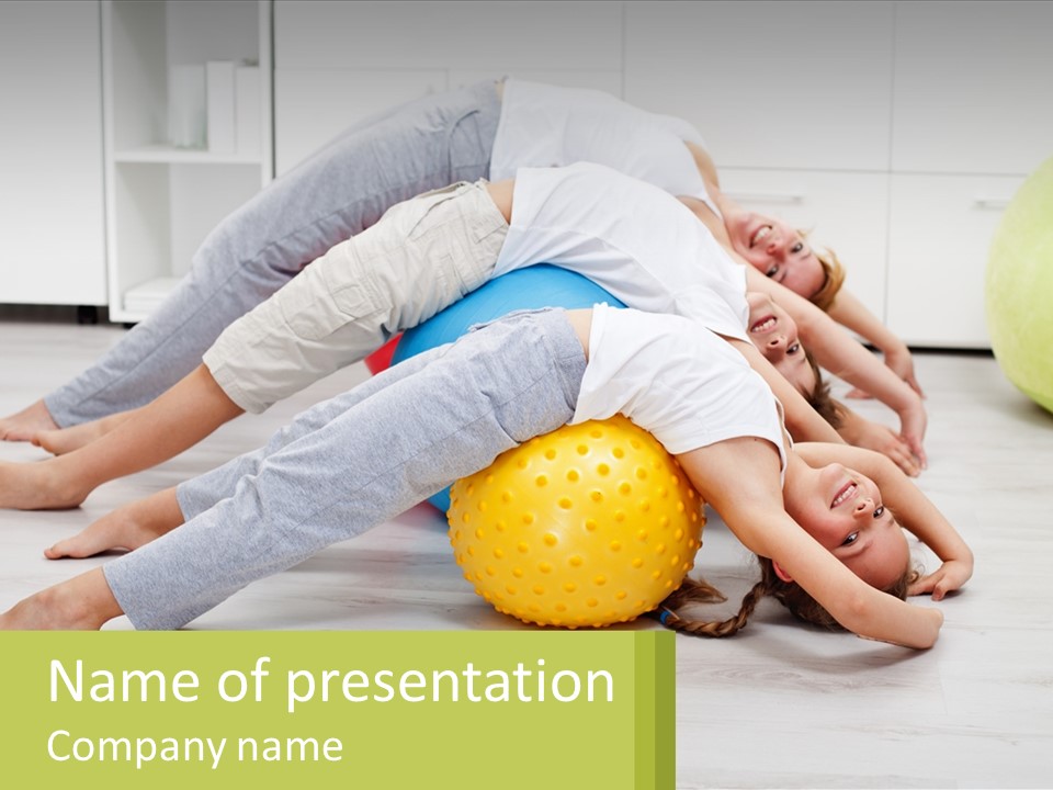 A Group Of People Laying On Top Of A Yellow Ball PowerPoint Template