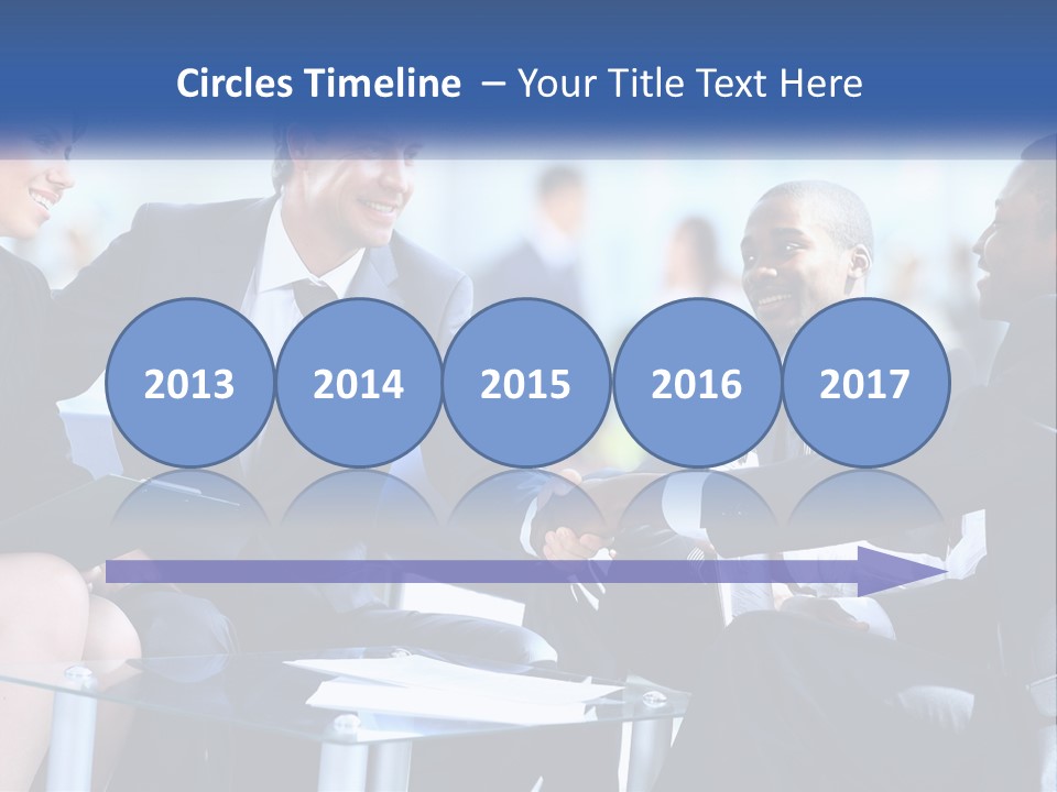 A Group Of Business People Shaking Hands Over A Table PowerPoint Template
