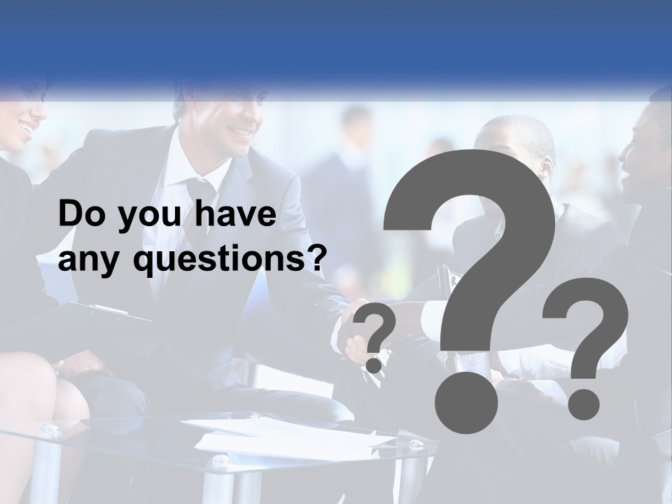 A Group Of Business People Shaking Hands Over A Table PowerPoint Template