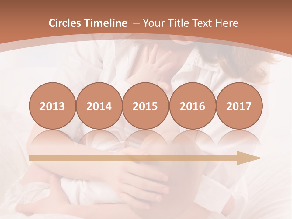 A Woman Holding A Baby In Her Arms PowerPoint Template