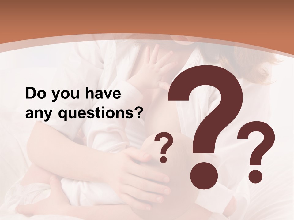 A Woman Holding A Baby In Her Arms PowerPoint Template