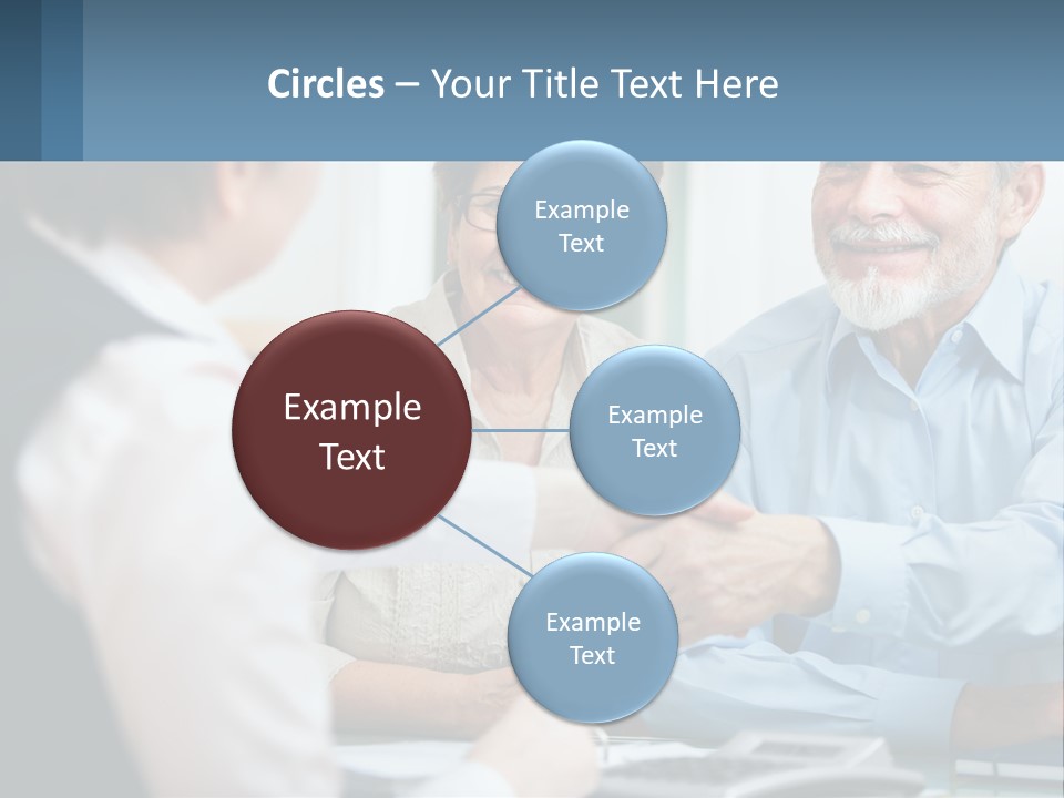 A Couple Of People Shaking Hands Over A Desk PowerPoint Template
