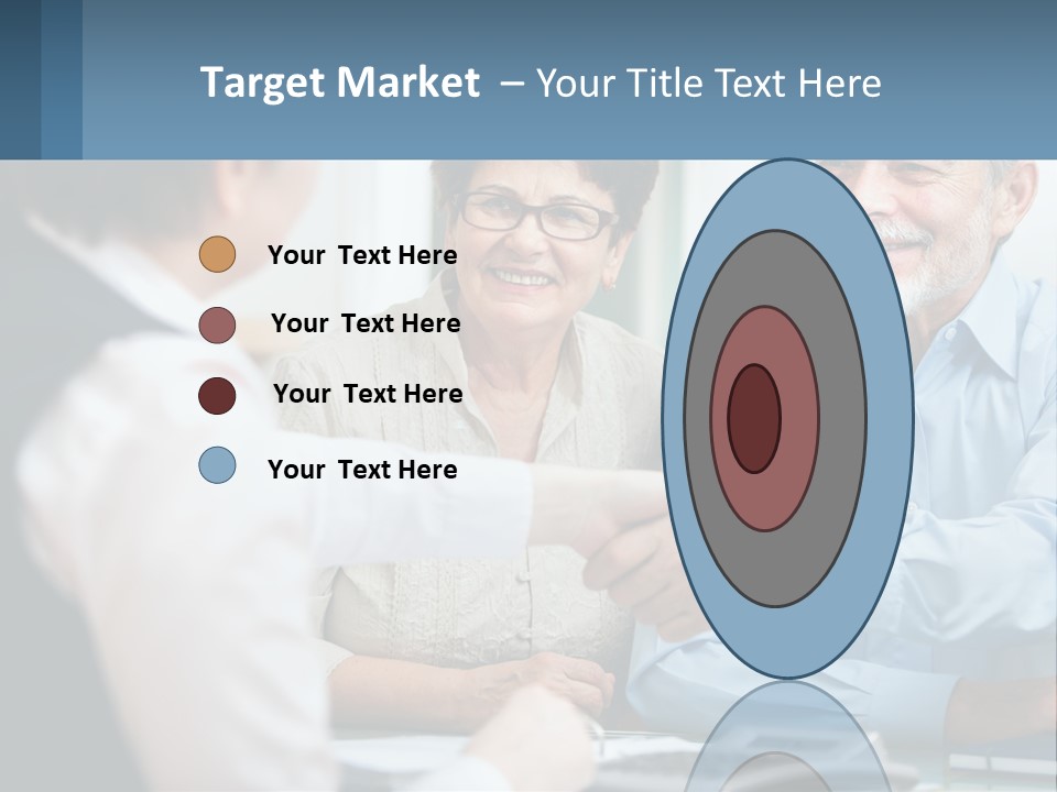 A Couple Of People Shaking Hands Over A Desk PowerPoint Template