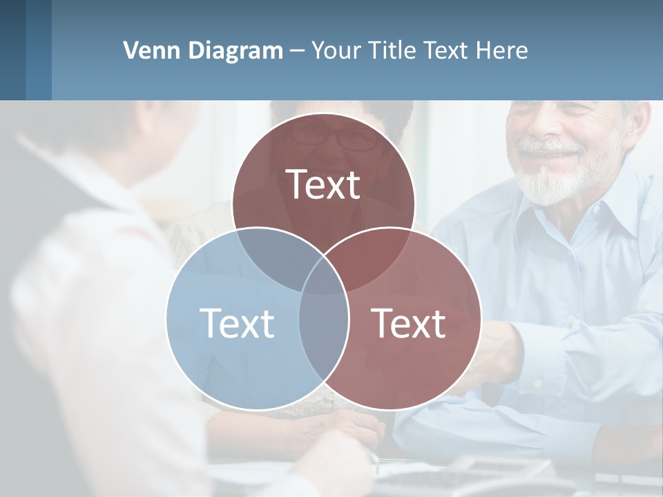 A Couple Of People Shaking Hands Over A Desk PowerPoint Template
