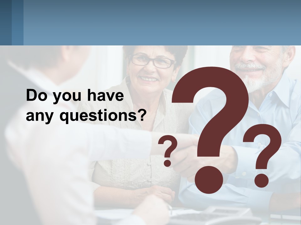 A Couple Of People Shaking Hands Over A Desk PowerPoint Template
